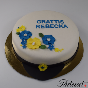 Studenttårta blåa och gula blommor med text